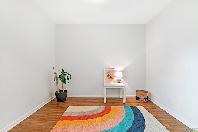 sitting room featuring hardwood / wood-style flooring