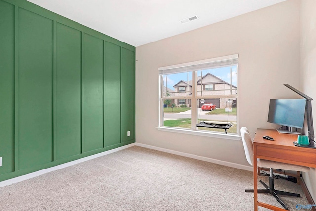 home office with light carpet