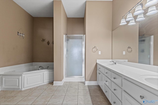 full bath featuring a sink, double vanity, a shower stall, and a bath