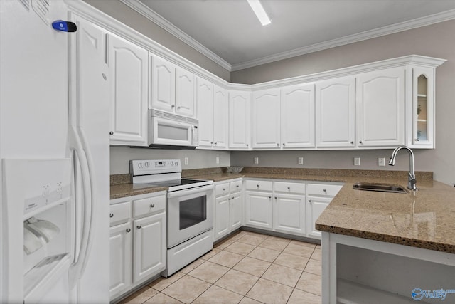 kitchen with white appliances, white cabinets, ornamental molding, and a sink