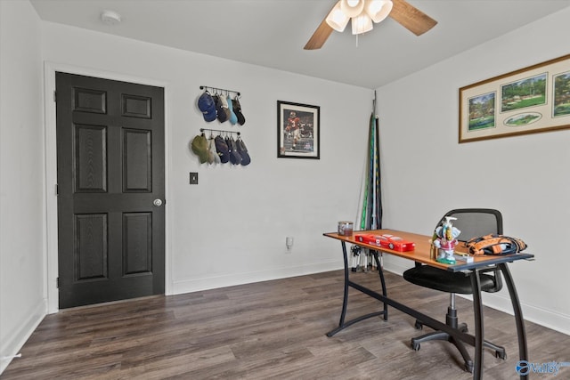 office featuring baseboards, ceiling fan, and dark wood-type flooring