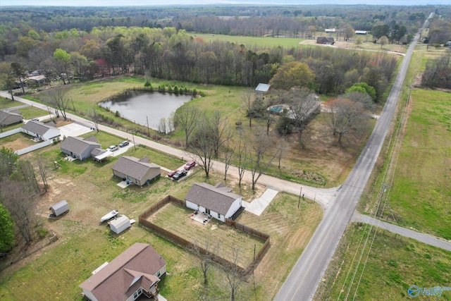 drone / aerial view with a water view and a rural view