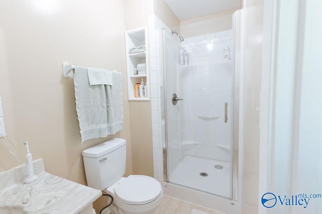 full bath with a shower stall and toilet