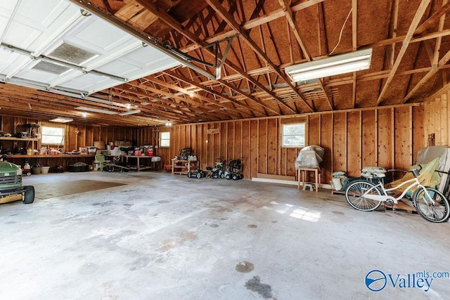 garage with a workshop area