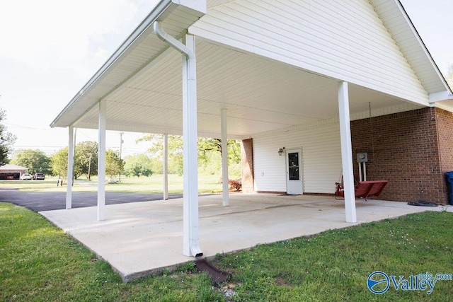 view of patio / terrace with an attached carport