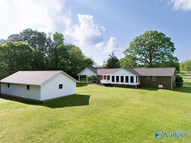 view of yard with a carport