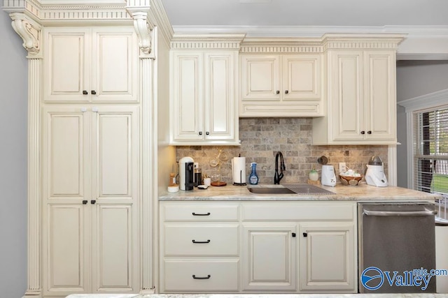 kitchen with cream cabinetry, dishwasher, sink, and tasteful backsplash