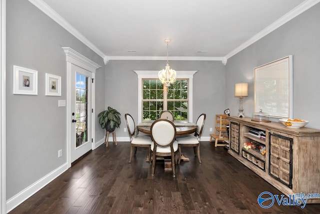 dining area featuring dark hardwood / wood-style flooring, an inviting chandelier, and ornamental molding