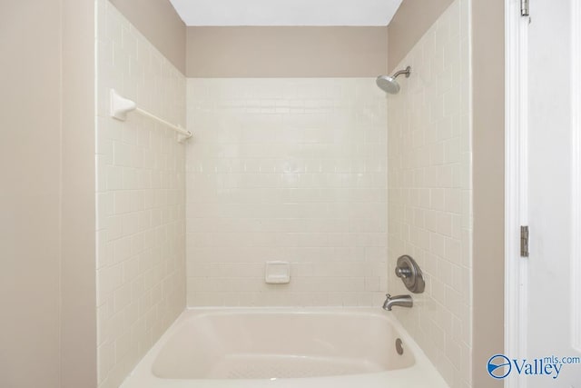 full bathroom with shower / washtub combination