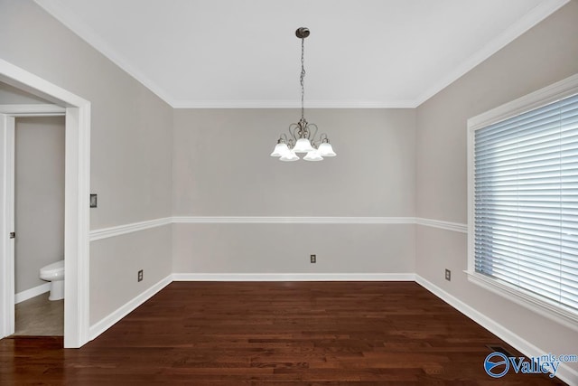 unfurnished dining area with baseboards, dark wood-type flooring, an inviting chandelier, and ornamental molding