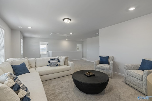 living area with baseboards, carpet flooring, and recessed lighting