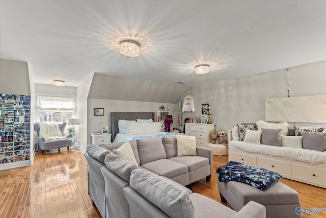 bedroom with hardwood / wood-style floors