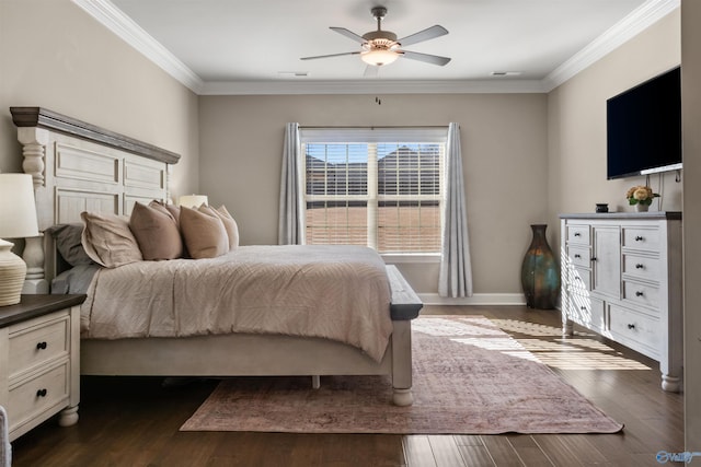 bedroom featuring baseboards, dark wood finished floors, a ceiling fan, and ornamental molding