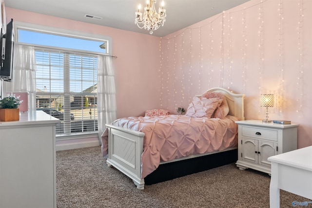 carpeted bedroom featuring a chandelier, visible vents, and wallpapered walls