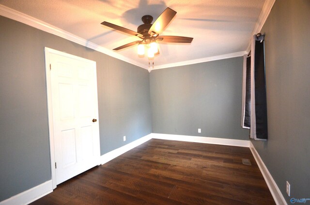 unfurnished room featuring ornamental molding, dark hardwood / wood-style floors, and ceiling fan