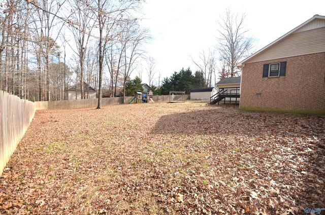 view of yard with a playground