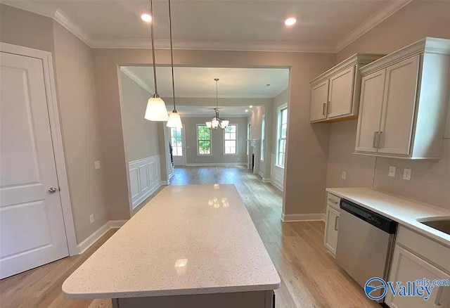 kitchen with light hardwood / wood-style flooring, a center island, stainless steel dishwasher, and hanging light fixtures