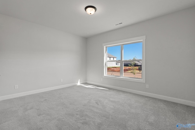 unfurnished room featuring carpet floors