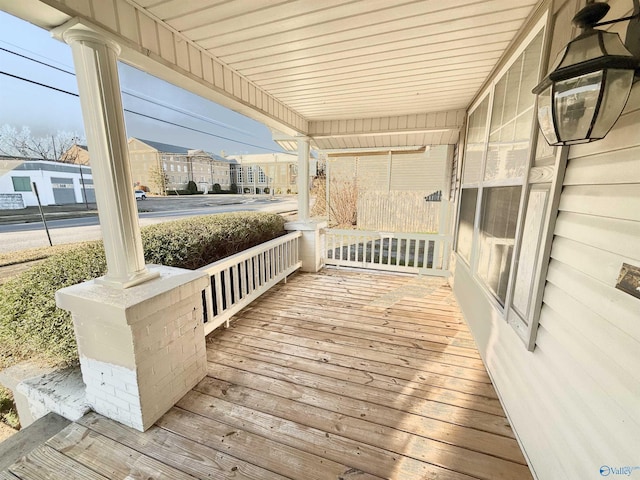 wooden terrace with covered porch