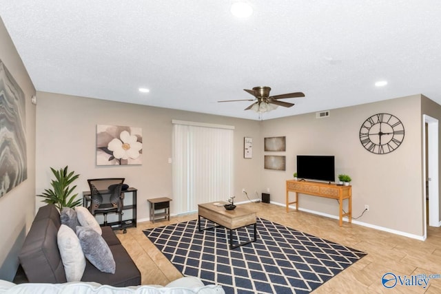 6616 Willow Pointe Dr Unit A, Huntsville, AL 35806 - living room with ceiling fan, recessed lighting, light tile patterned floors, a textured ceiling, and baseboards