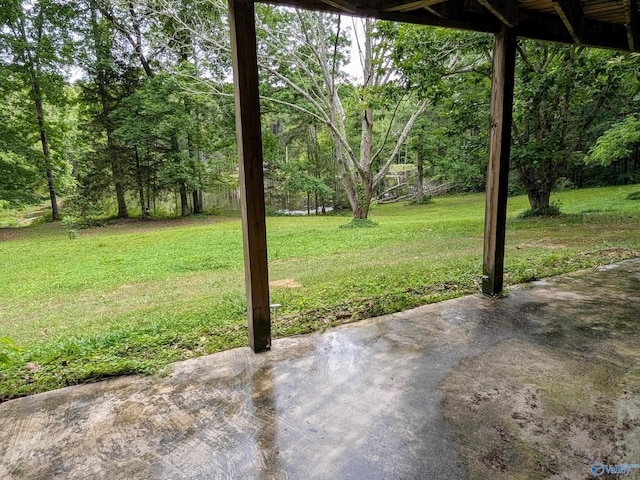 143 Maze Dr, Hartselle, AL 35640 - view of green lawn featuring a patio