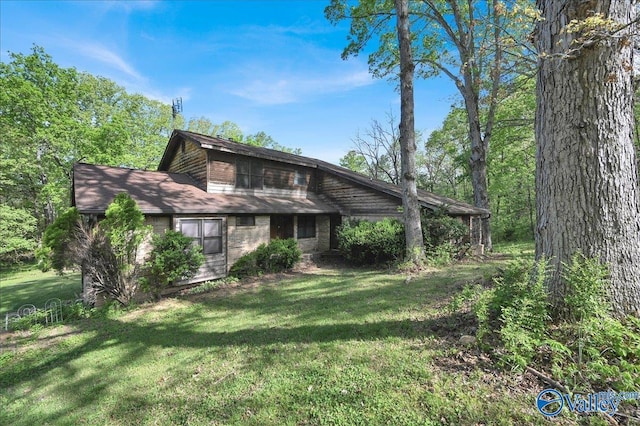 143 Maze Dr, Hartselle, AL 35640 - back of house with a lawn