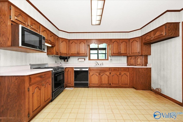 143 Maze Dr, Hartselle, AL 35640 - kitchen featuring black appliances, a sink, light countertops, brown cabinetry, and crown molding
