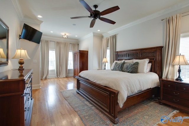 bedroom with a ceiling fan, recessed lighting, crown molding, light wood finished floors, and baseboards