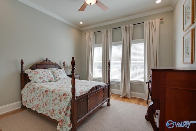 bedroom with recessed lighting, light wood-type flooring, baseboards, and ornamental molding