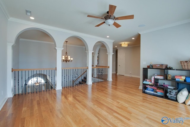 empty room featuring visible vents, crown molding, baseboards, recessed lighting, and wood finished floors