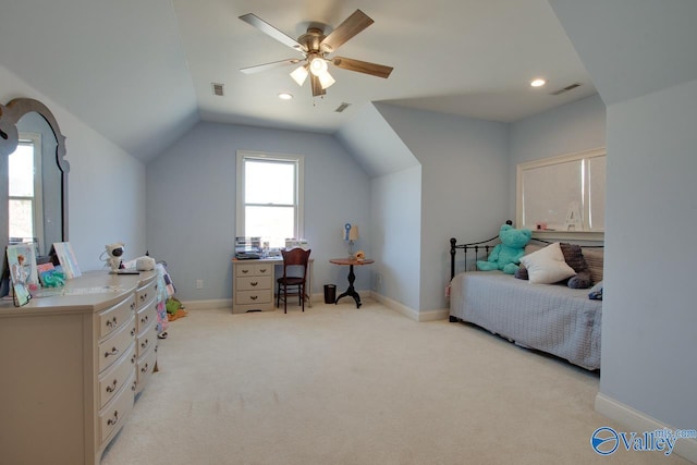 bedroom with visible vents, baseboards, and lofted ceiling