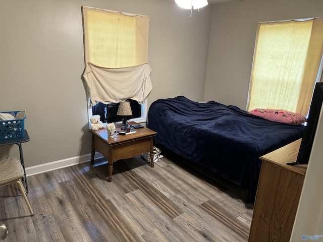 bedroom featuring dark hardwood / wood-style floors