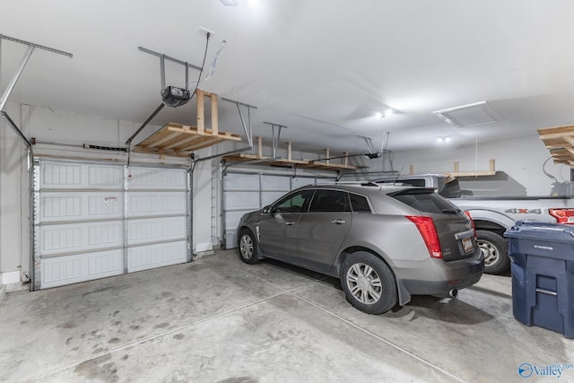 garage featuring a garage door opener