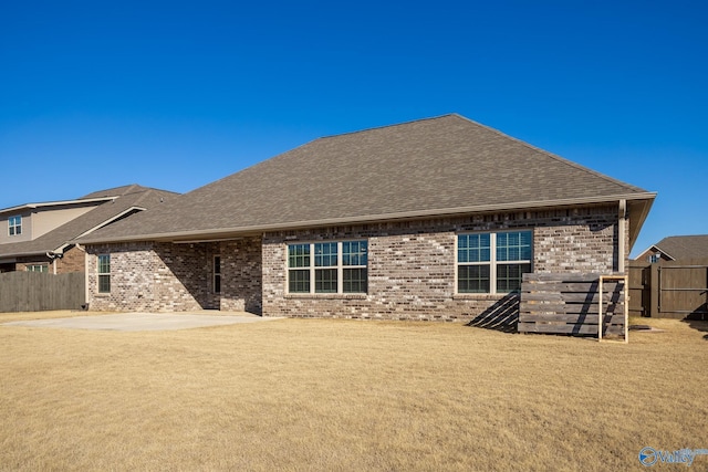 rear view of property featuring a patio area