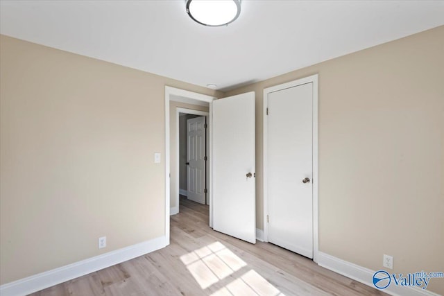 unfurnished bedroom featuring light hardwood / wood-style flooring