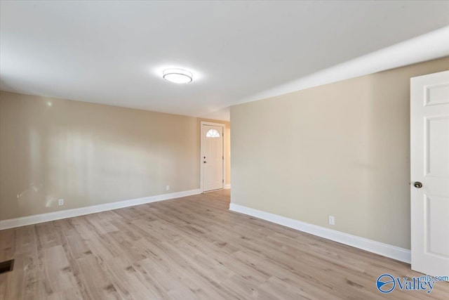 empty room featuring light hardwood / wood-style floors