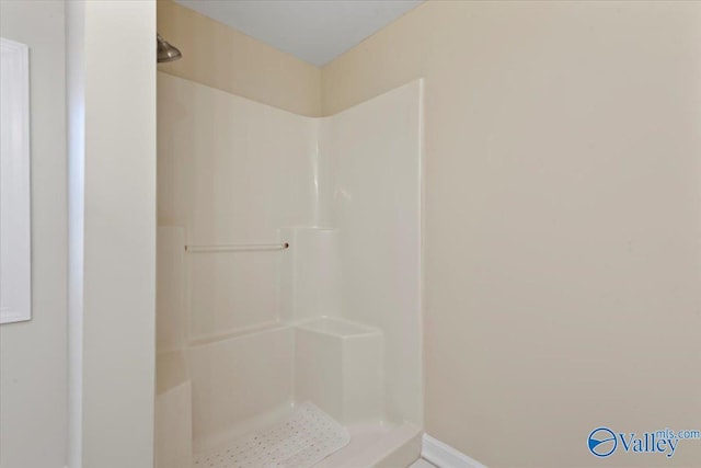 bathroom with walk in shower