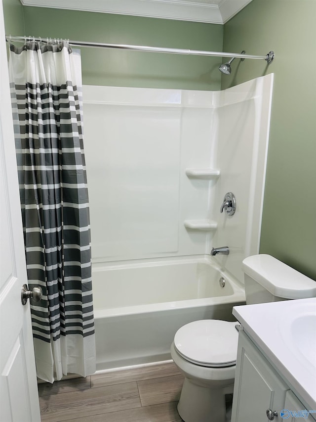 full bathroom featuring vanity, wood-type flooring, shower / bath combination with curtain, and toilet