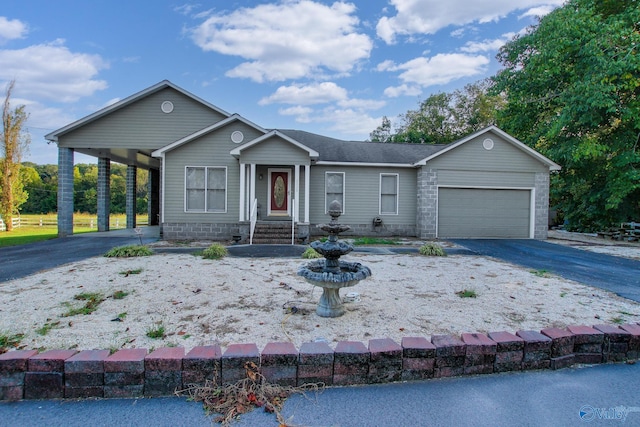 single story home with a garage