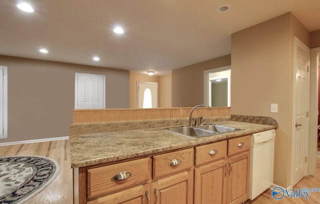 2220 Jefferson St, Courtland, AL 35618 - kitchen with white dishwasher, a sink, light wood-type flooring, recessed lighting, and baseboards