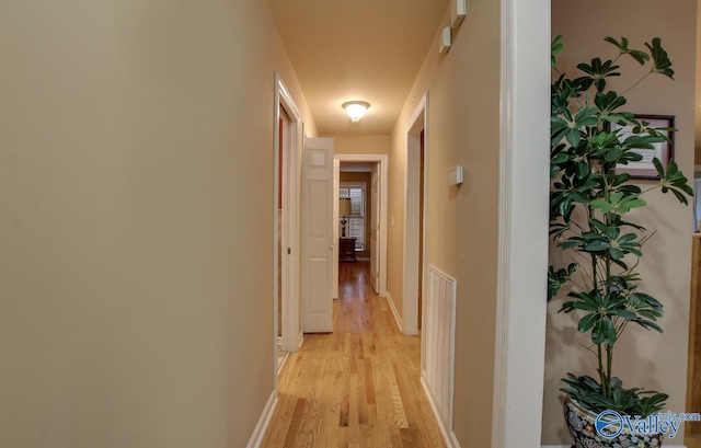 2220 Jefferson St, Courtland, AL 35618 - hall with light wood-type flooring and baseboards