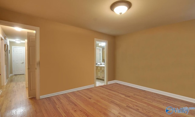 2220 Jefferson St, Courtland, AL 35618 - unfurnished room with light wood-type flooring and baseboards
