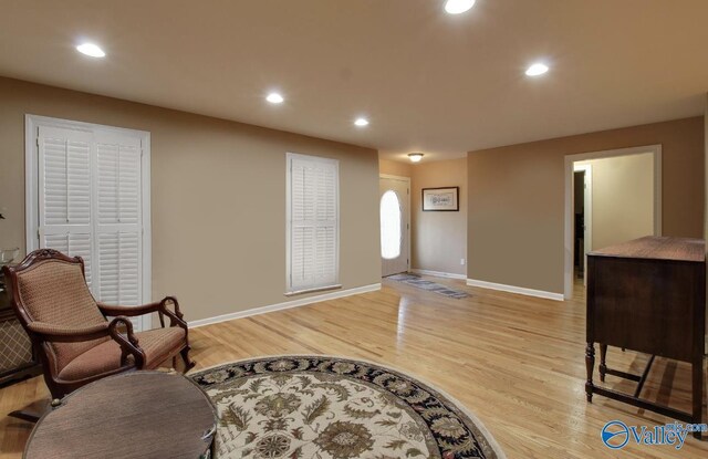 2220 Jefferson St, Courtland, AL 35618 - foyer entrance with light wood-style flooring, baseboards, and recessed lighting