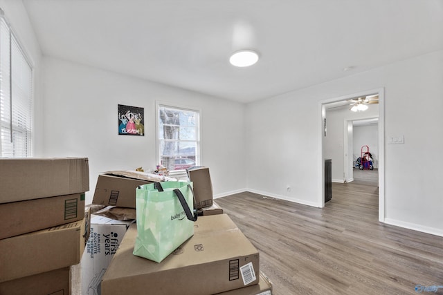 office with wood finished floors and baseboards
