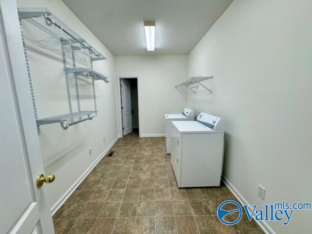 17215 Eunice Ln, Athens, AL 35613 - laundry room featuring independent washer and dryer and baseboards