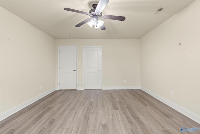 unfurnished bedroom featuring ceiling fan and light hardwood / wood-style flooring