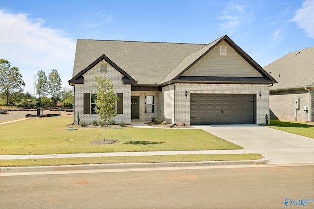 craftsman-style home featuring a garage and a front lawn