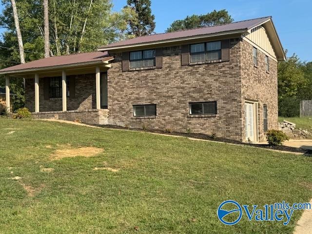 exterior space with a front lawn