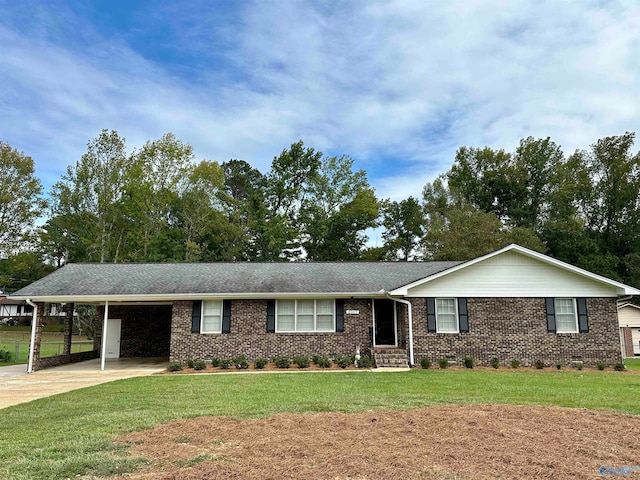 single story home featuring a carport and a front lawn