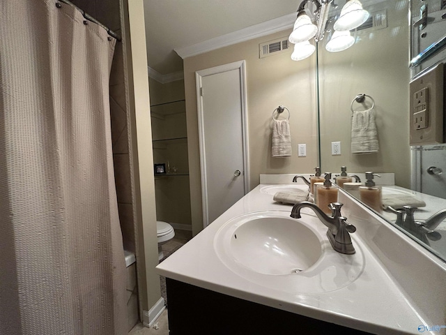 bathroom with ornamental molding, a shower with shower curtain, vanity, and toilet